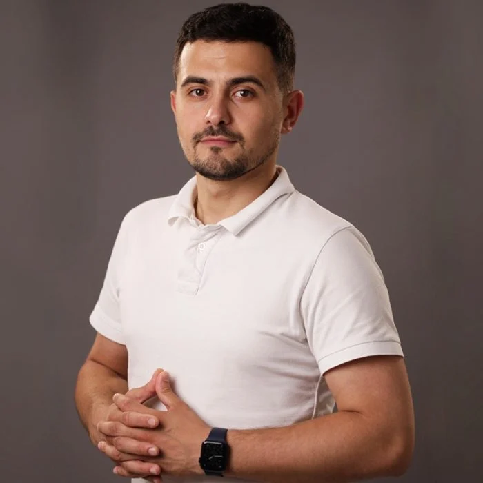 Dr. Ion Vascauțan (Nellu) - medic dentist Clinica Punto Bianco Moldova - specializat în endodonție, restaurări și protetică dentară